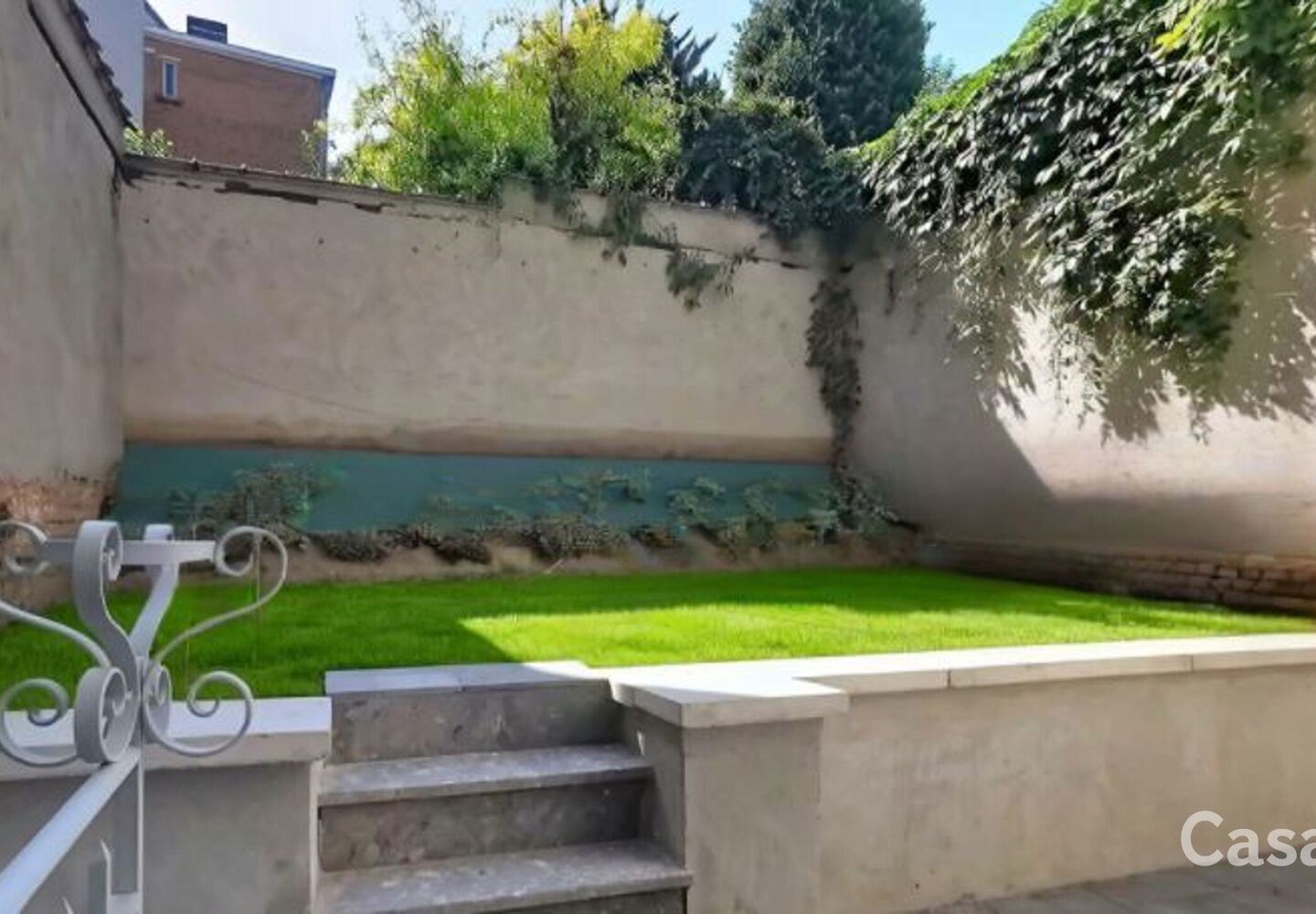 Gelijkvloerse verd. + tuin te koop in Schaarbeek