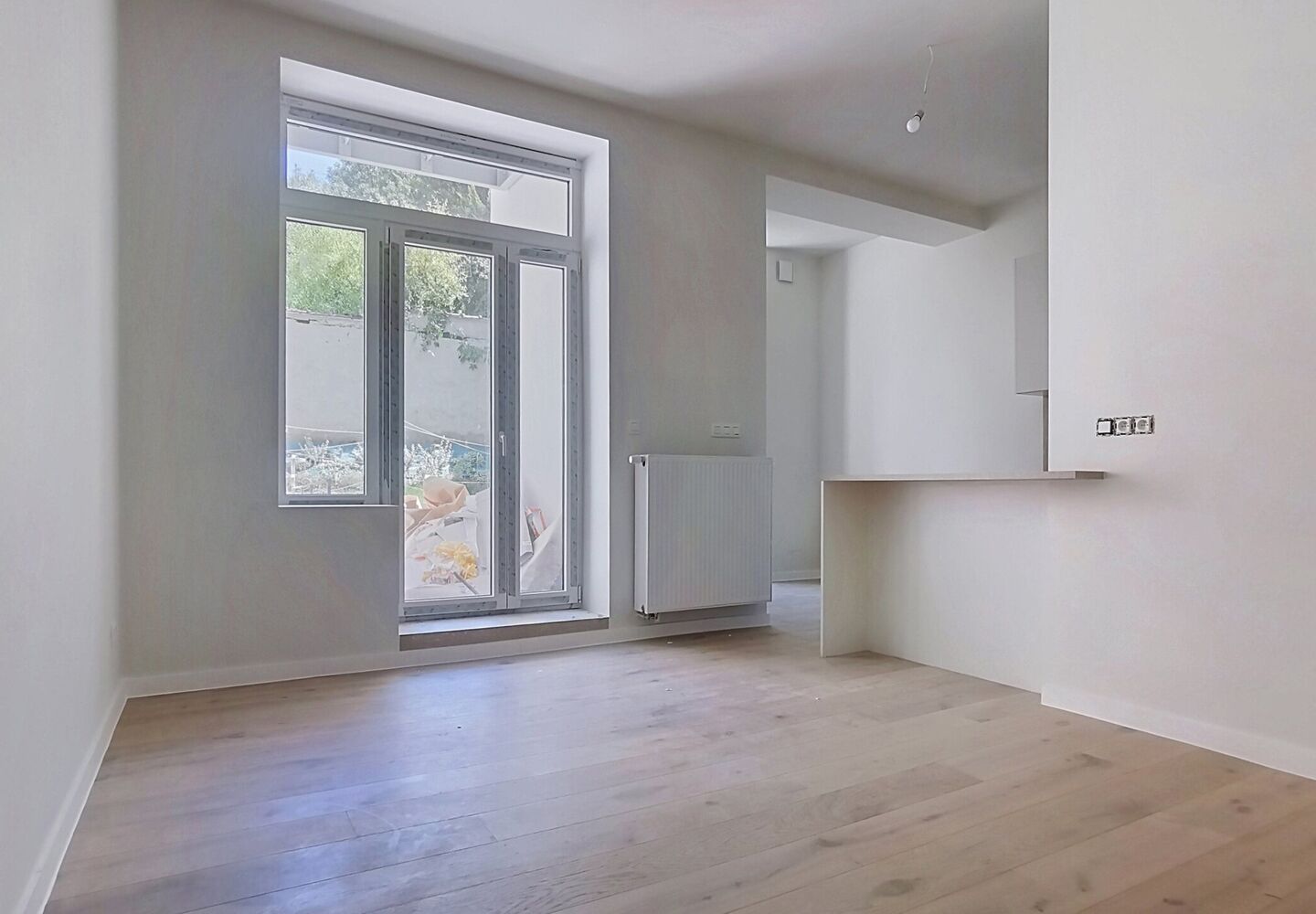 Gelijkvloerse verd. + tuin te koop in Schaarbeek